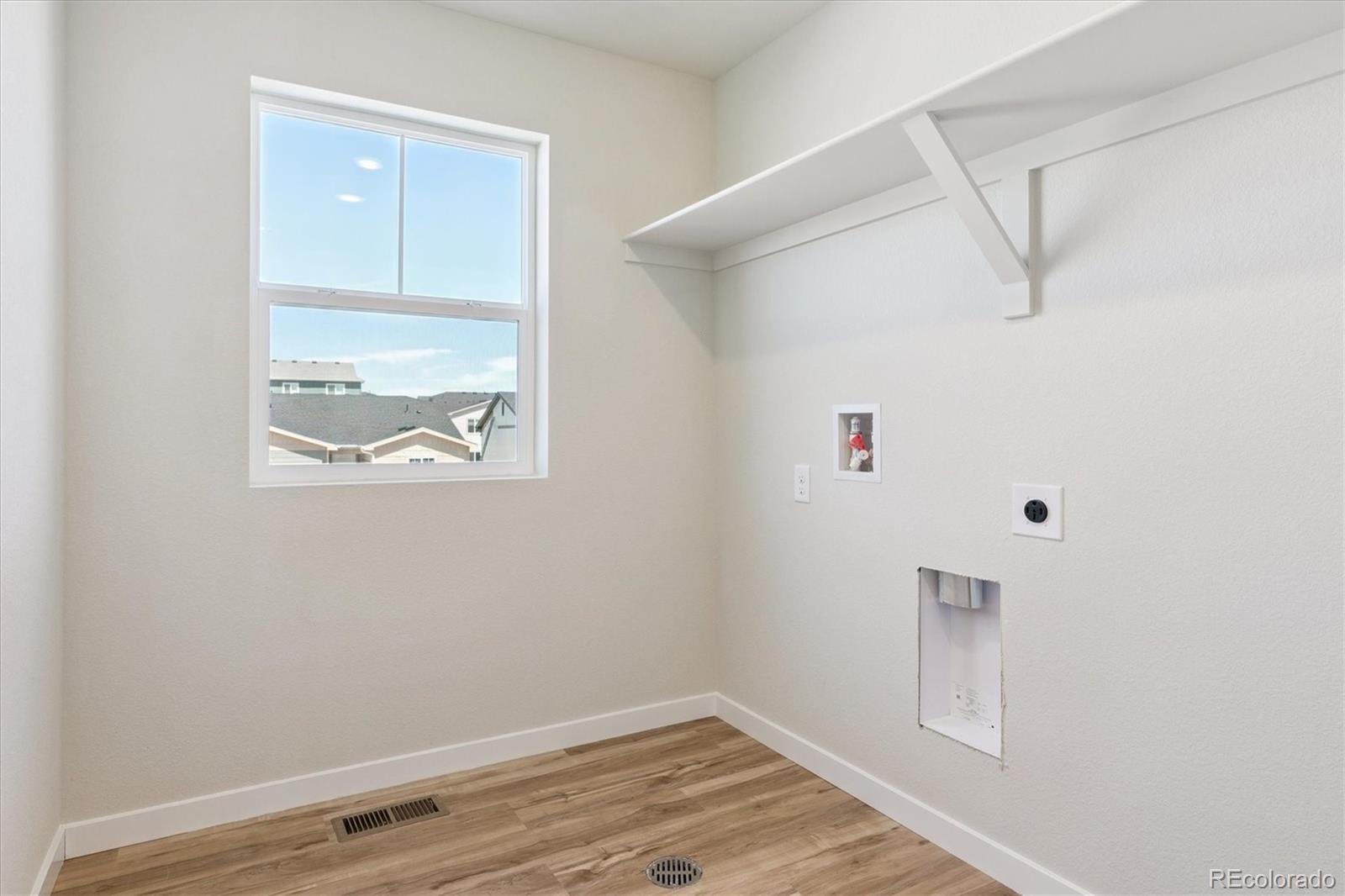 4235 Gozzer Ranch Drive Elizabeth, CO 80107 - Photo 16 of 23 a view of small space with wooden floor