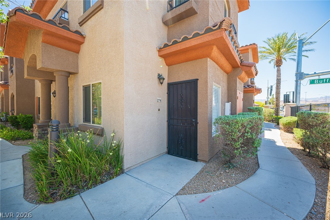 7701 West Robindale Road, Unit 274 Las Vegas, NV 89113 - Photo 2 of 38 This charming townhouse features a welcoming entrance and mature landscaping.