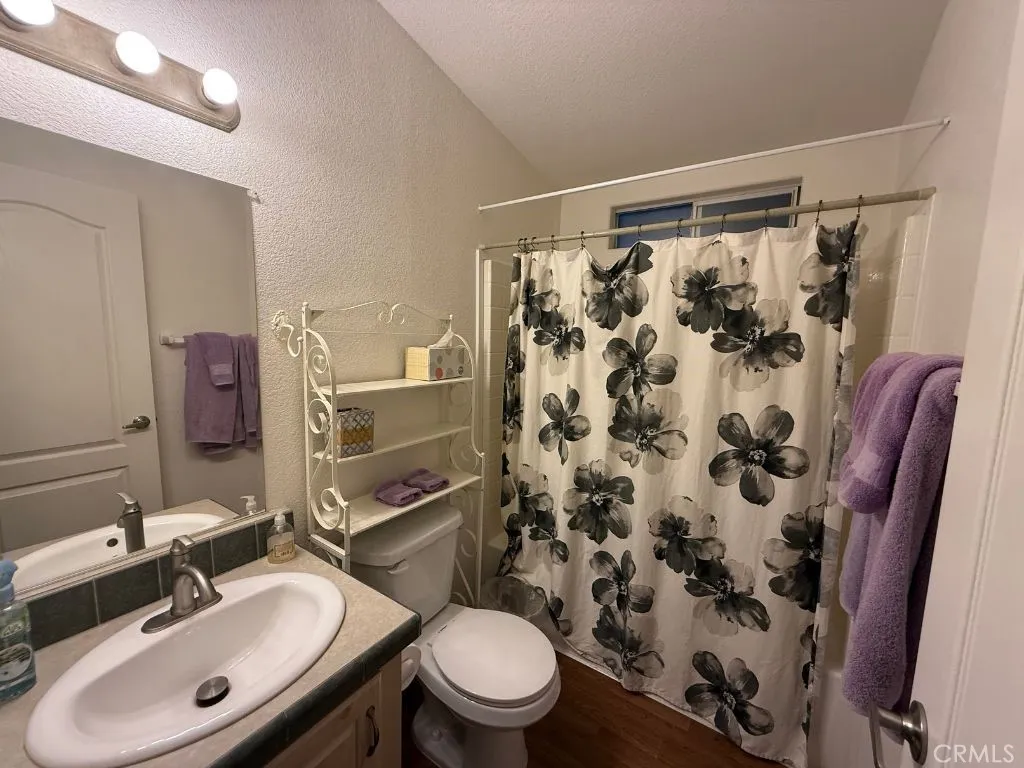 1001 South Hale, Unit 13 Escondido, CA 92025 - Photo 15 of 20 a bathroom with a sink toilet and shower