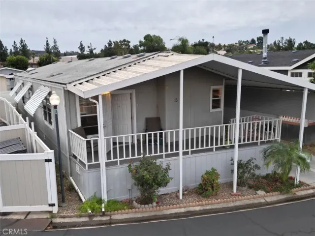 a view of a house with a deck