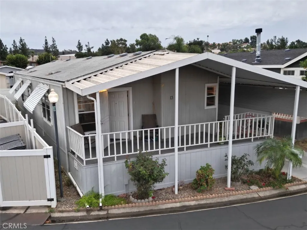 1001 South Hale, Unit 13 Escondido, CA 92025 - Photo 19 of 20 a view of a house with a deck