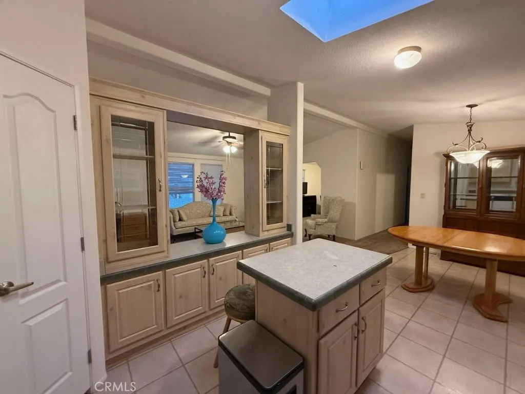 1001 South Hale, Unit 13 Escondido, CA 92025 - Photo 5 of 20 a room with a table chairs and projector view