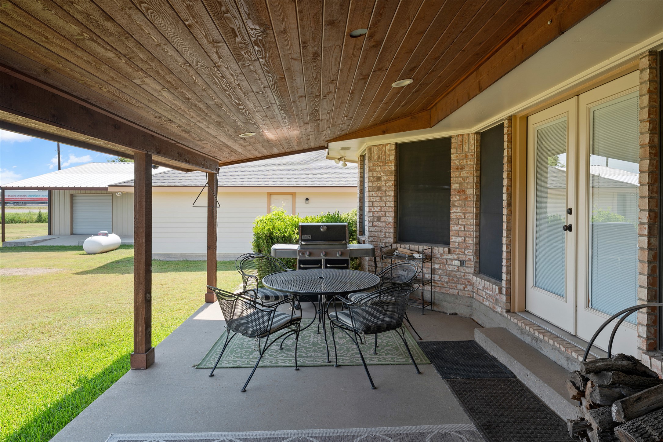 1512 Panther Loop Pflugerville, TX 78660 - Photo 29 of 40 A well-appointed covered patio offers an inviting space for outdoor dining and relaxation.