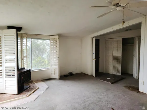 an empty room with windows