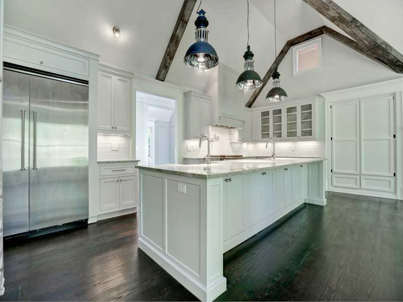 Kitchen. Dream kitchen with large island with Professional grade Viking appliances - 2 dishwashers, 48" Viking Range and built-in refrigerator.