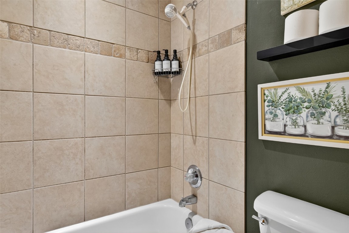 260 Ski Hill Road, Unit 6 Breckenridge, CO 80424 - Photo 18 of 25 Bathroom featuring toilet and washtub / shower combination