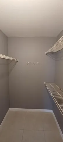 a view of a room with racks on the wall