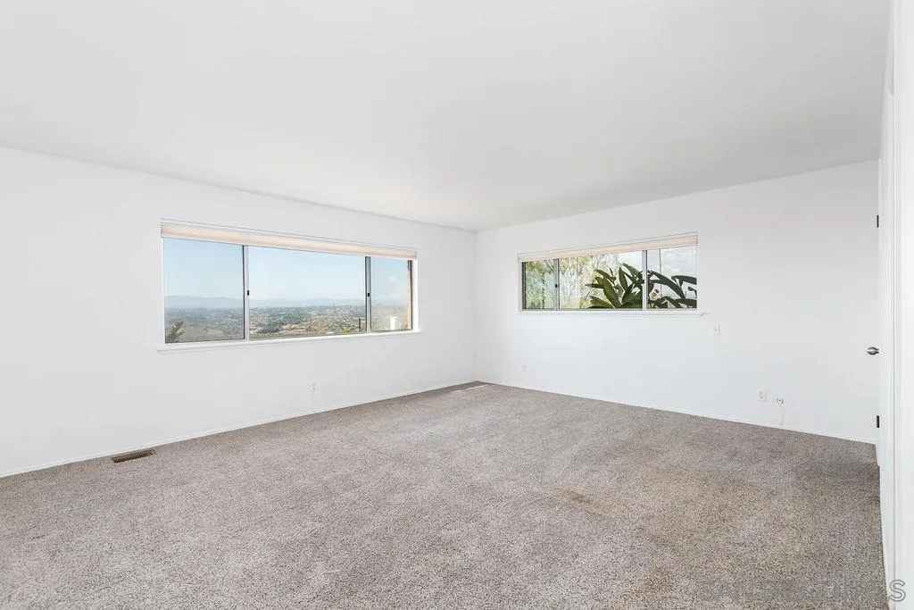6778 West Lilac Road Bonsall, CA 92003 - Photo 11 of 45 an empty room with a window