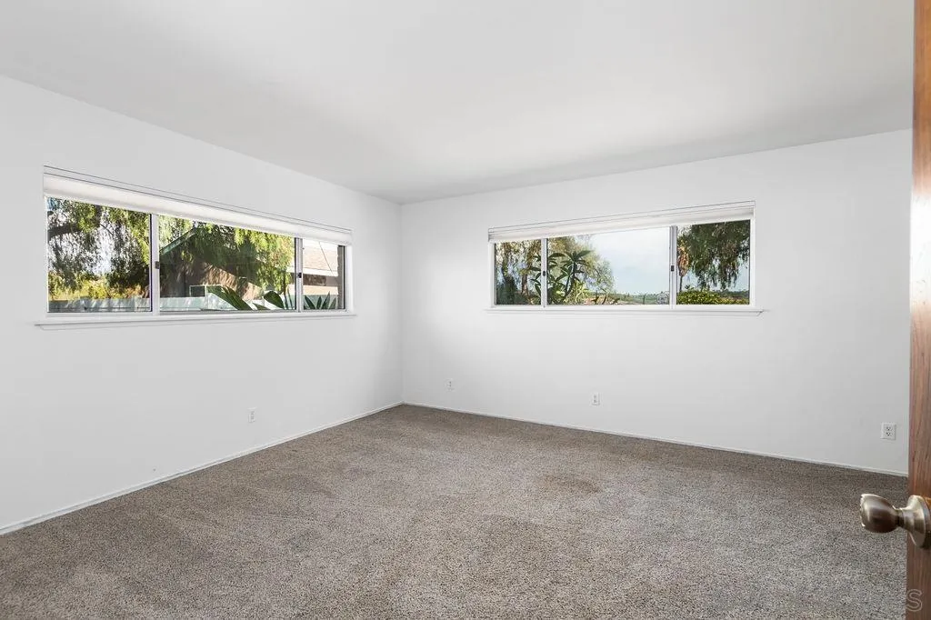 6778 West Lilac Road Bonsall, CA 92003 - Photo 13 of 45 a view of an empty room with a window