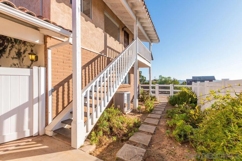 6778 West Lilac Road Bonsall, CA 92003 - Photo 26 of 45 a view of a pathway of a building from a balcony