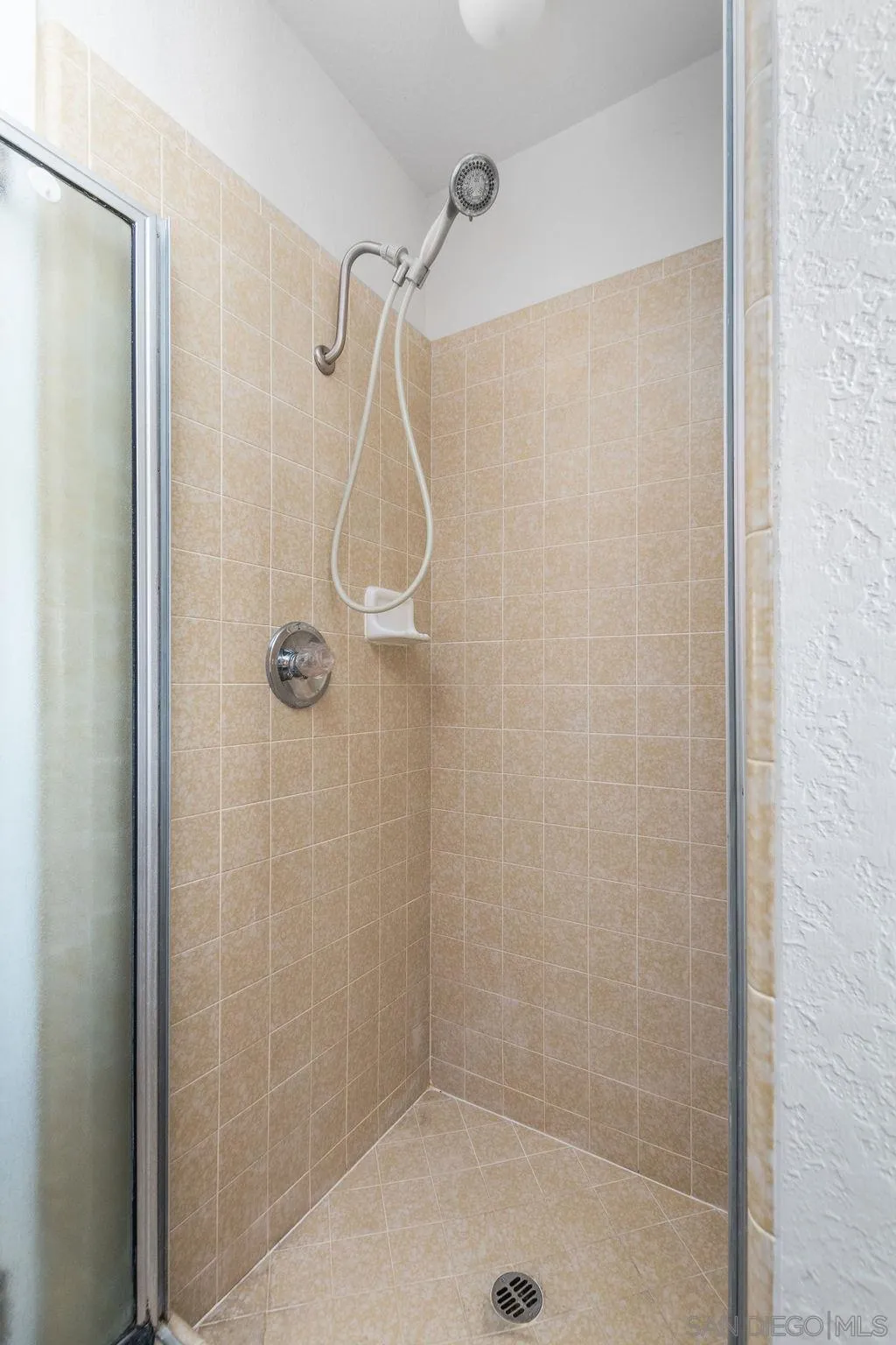 6778 West Lilac Road Bonsall, CA 92003 - Photo 34 of 45 a bathroom with a shower