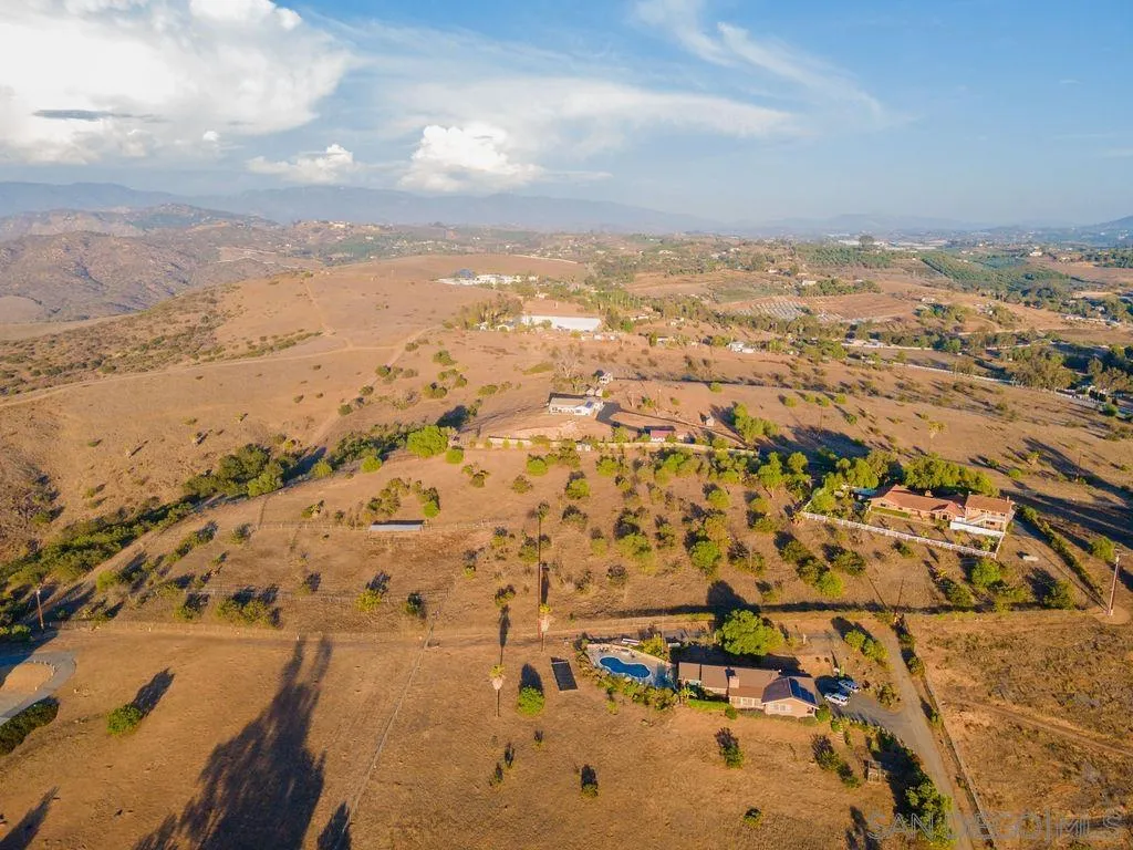6778 West Lilac Road Bonsall, CA 92003 - Photo 45 of 45 an aerial view of residential houses with outdoor space