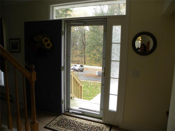 58 Baker Pond Road Dudley, MA 01571 - Photo 23 of 29 a view of a windows and an entryway