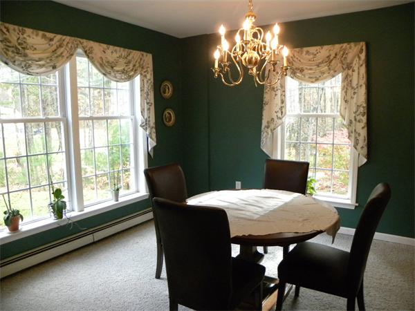 58 Baker Pond Road Dudley, MA 01571 - Photo 8 of 29 a view of a dining room with furniture window and outside view