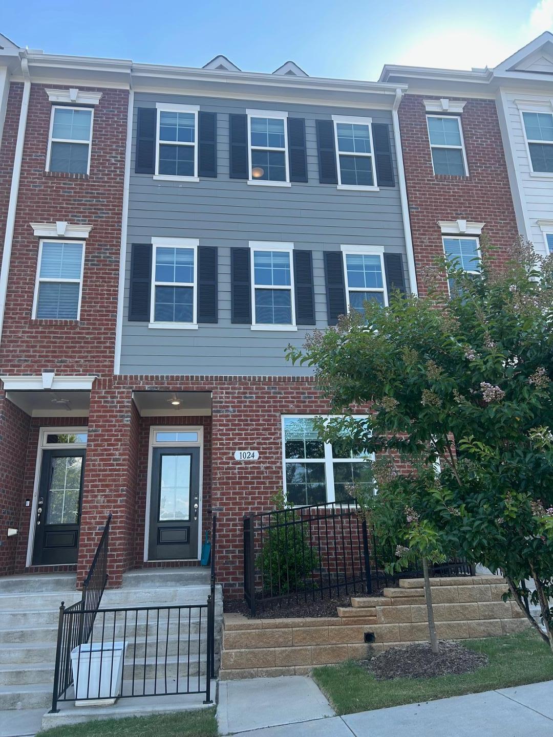 1024 Gateway Commons Circle Wake Forest, NC 27587 - Photo 1 of 18 a front view of a house