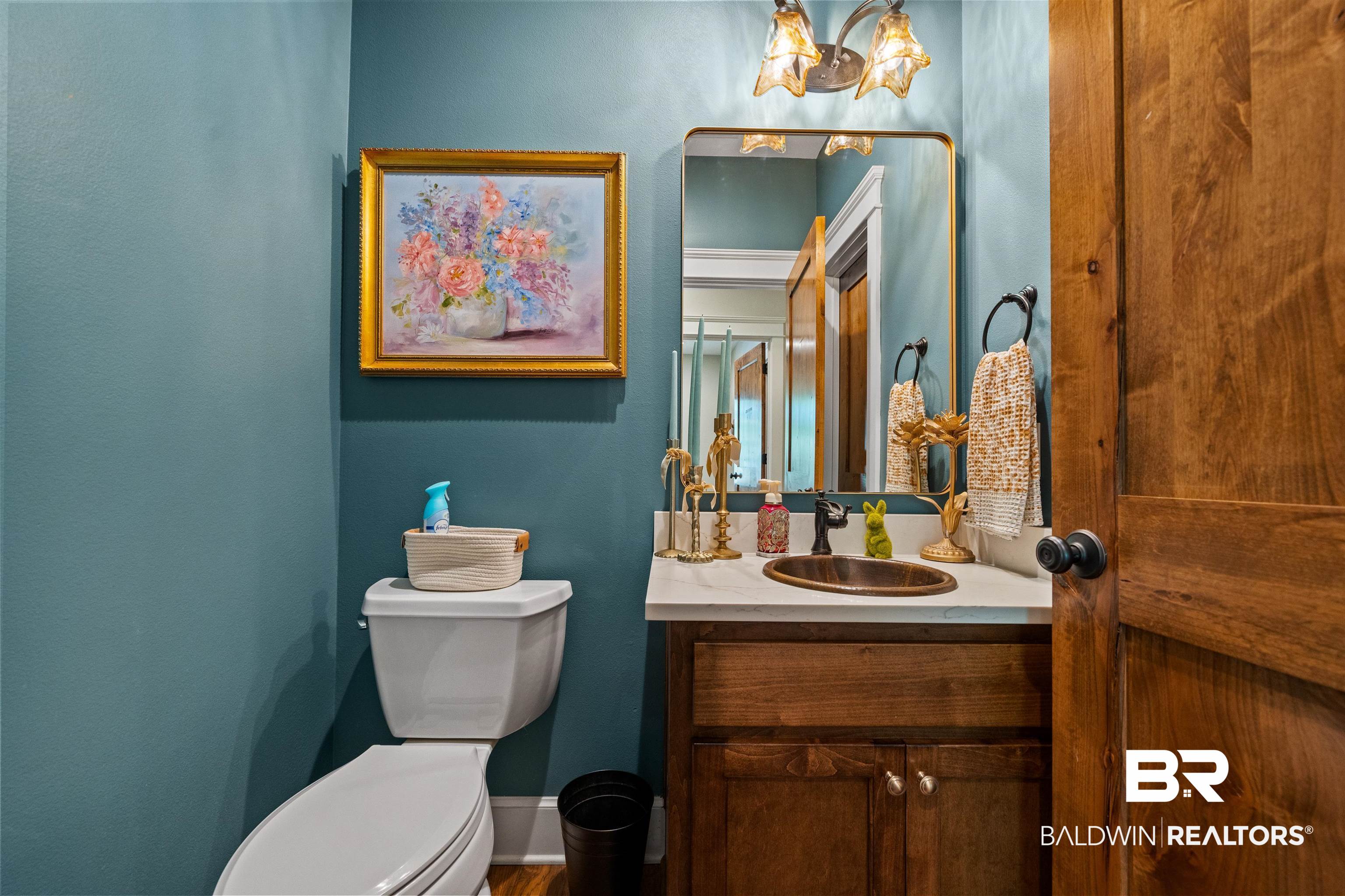 47252 Emmons Road Bay Minette, AL 36507 - Photo 33 of 50 Half bath featuring vanity and toilet