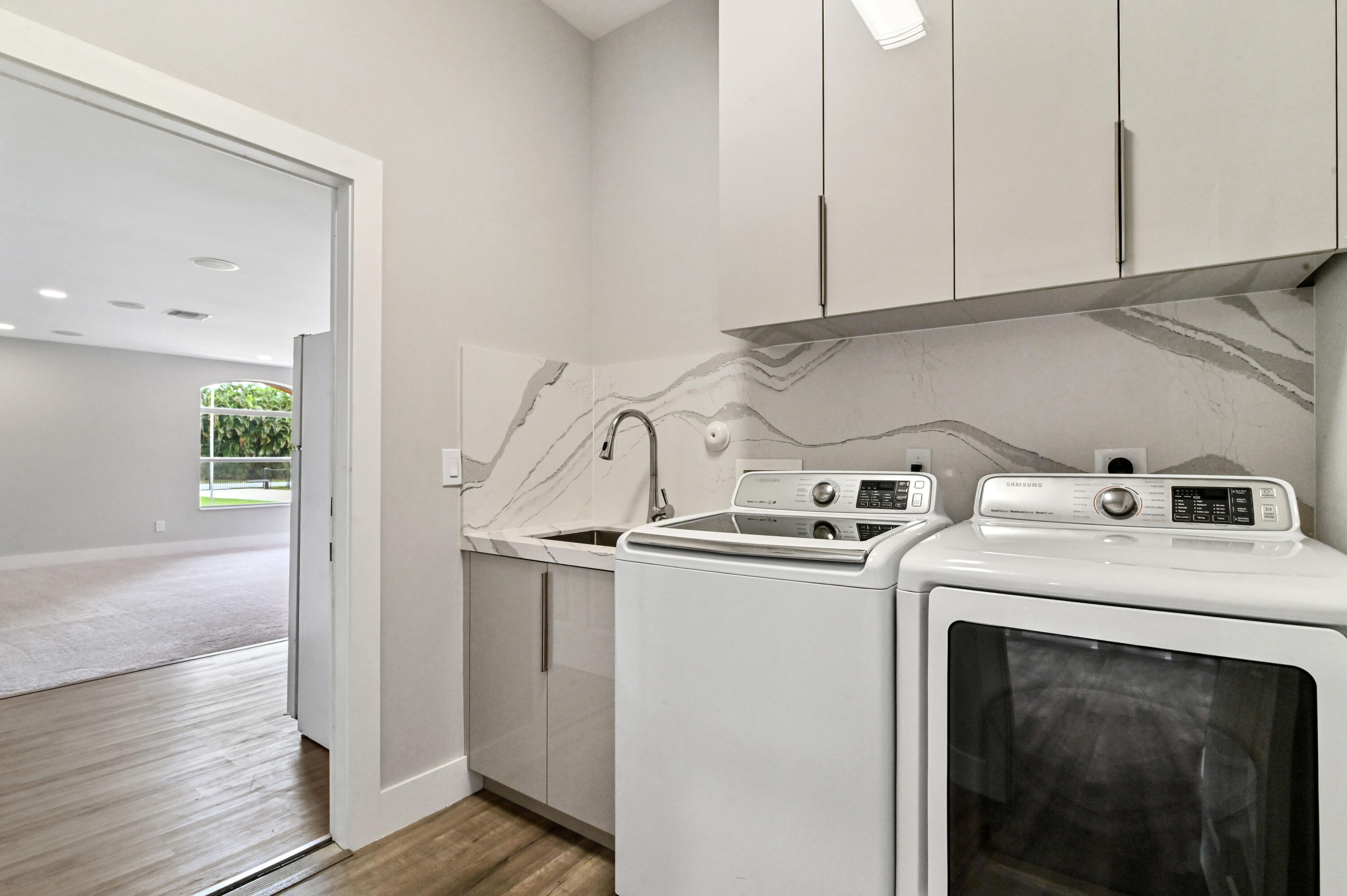 16409 Temple Boulevard Loxahatchee, FL 33470 - Photo 34 of 78 30 laundry room 01