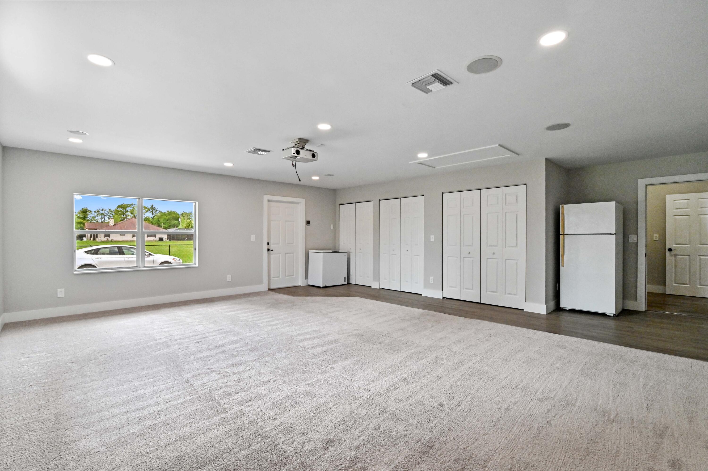 16409 Temple Boulevard Loxahatchee, FL 33470 - Photo 37 of 78 Media Room