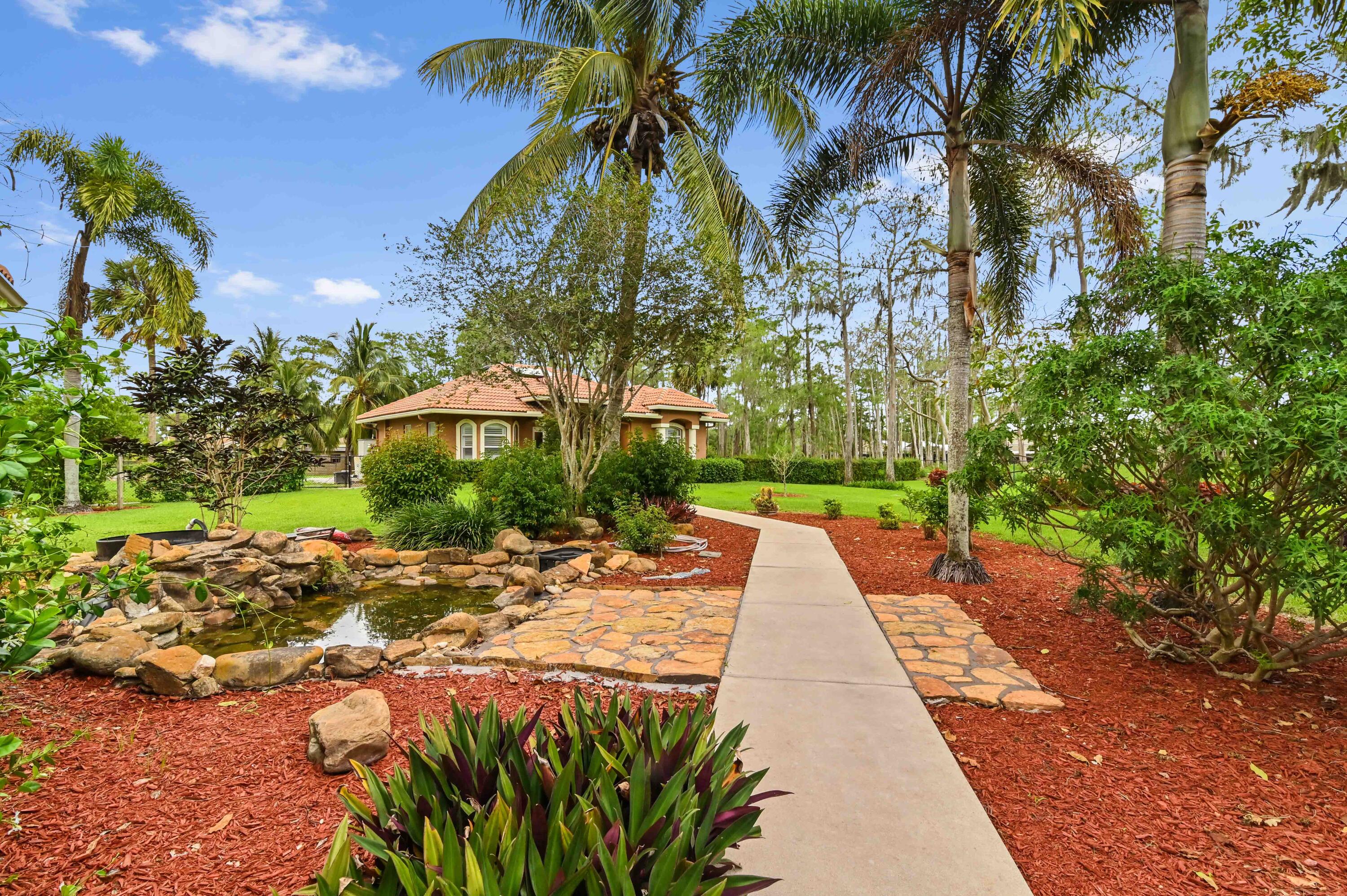 16409 Temple Boulevard Loxahatchee, FL 33470 - Photo 44 of 78 47 Backyard 01