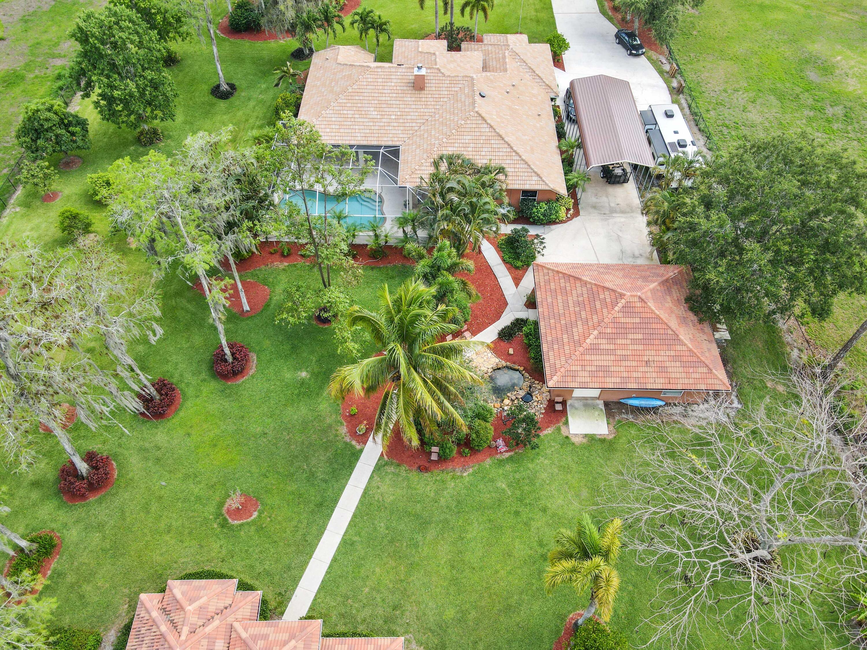 16409 Temple Boulevard Loxahatchee, FL 33470 - Photo 69 of 78 75 drone 10