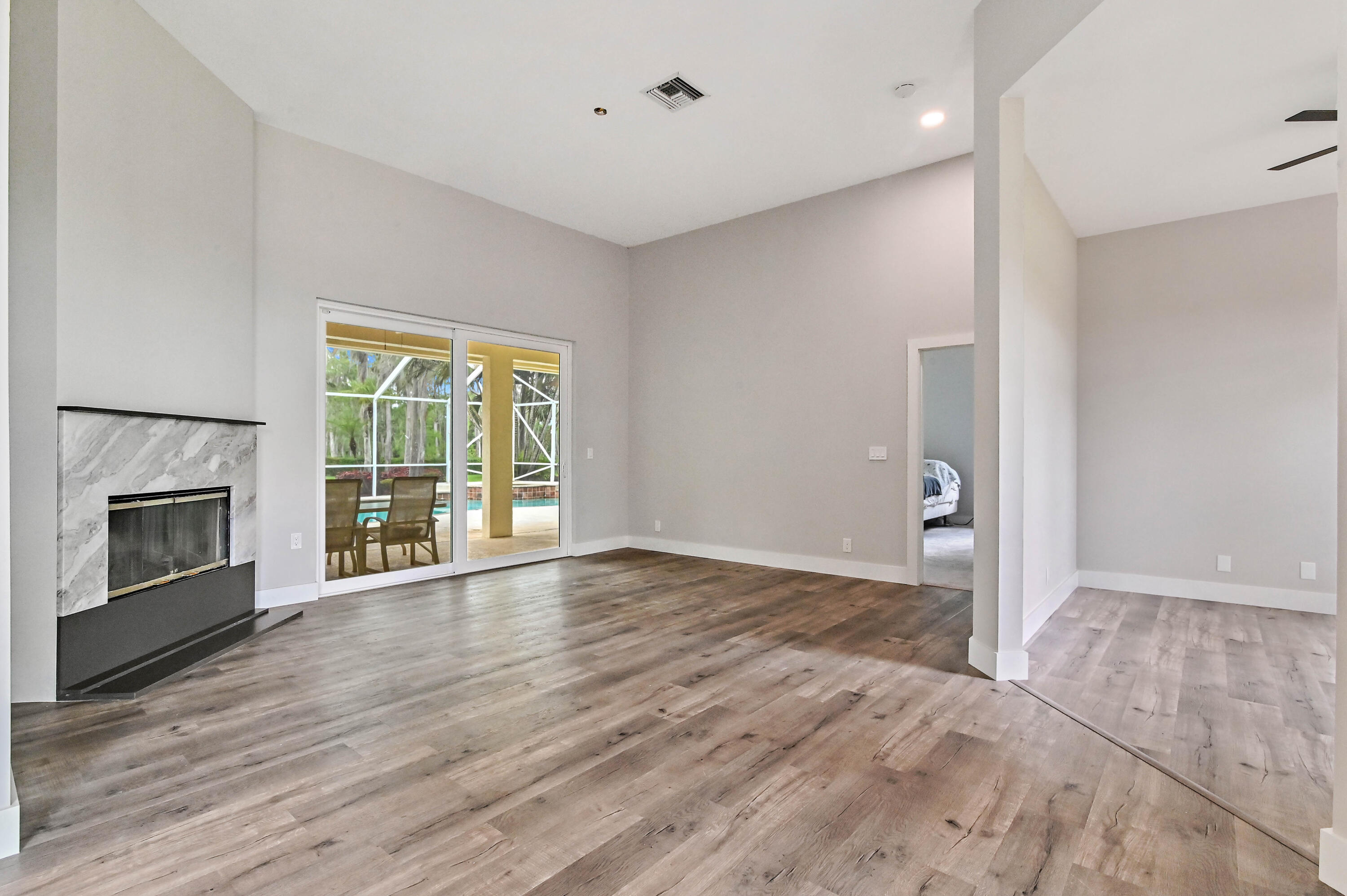 16409 Temple Boulevard Loxahatchee, FL 33470 - Photo 7 of 78 06 Living Room 02