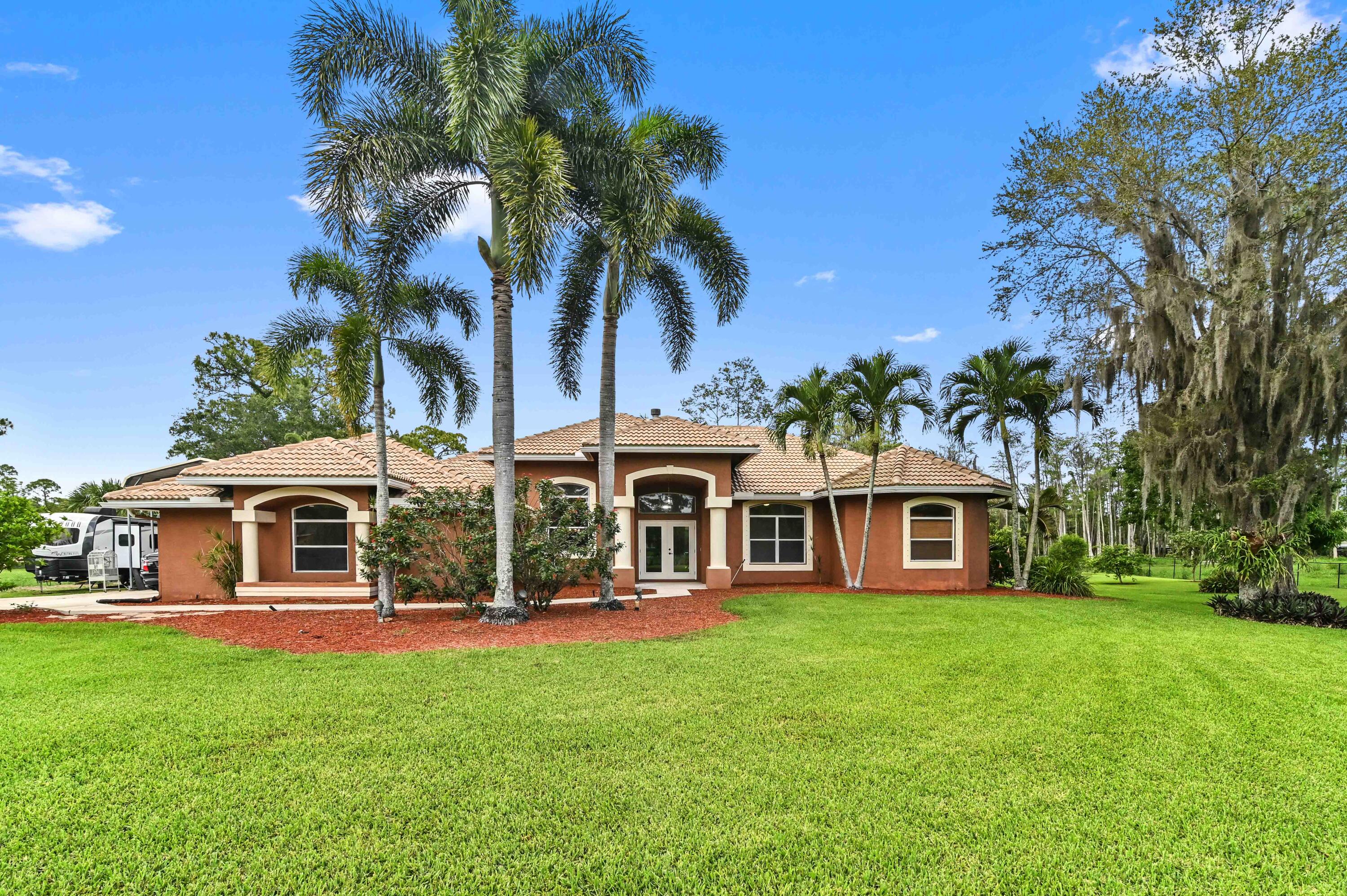 16409 Temple Boulevard Loxahatchee, FL 33470 - Photo 72 of 78 01 Front 01