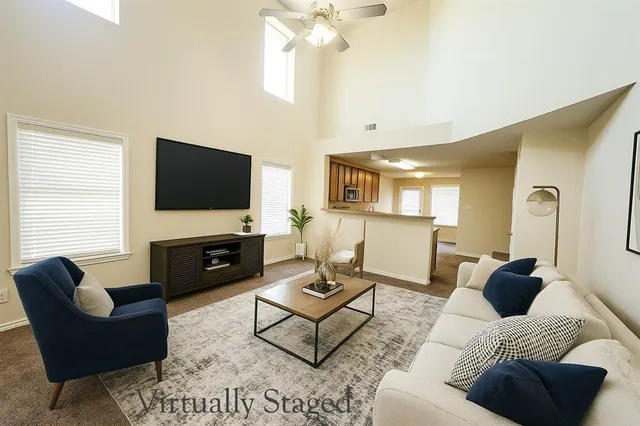 a view of a dining room with furniture wooden floor and a rug