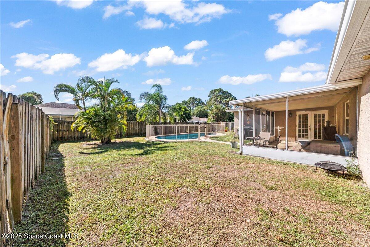 985 Sycamore Drive Rockledge, FL 32955 - Photo 21 of 26 a view of a house with backyard and sitting area