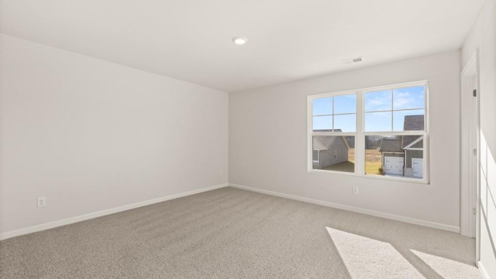 703 Anchor Avenue Villa Rica, GA 30180 - Photo 26 of 32 an empty room with a window