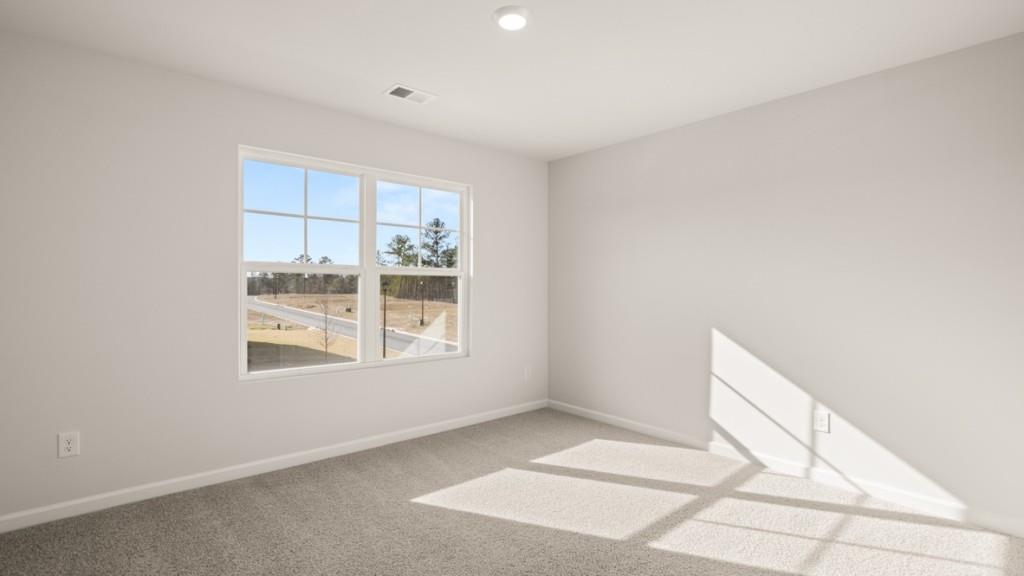 703 Anchor Avenue Villa Rica, GA 30180 - Photo 28 of 32 a view of an empty room with a window