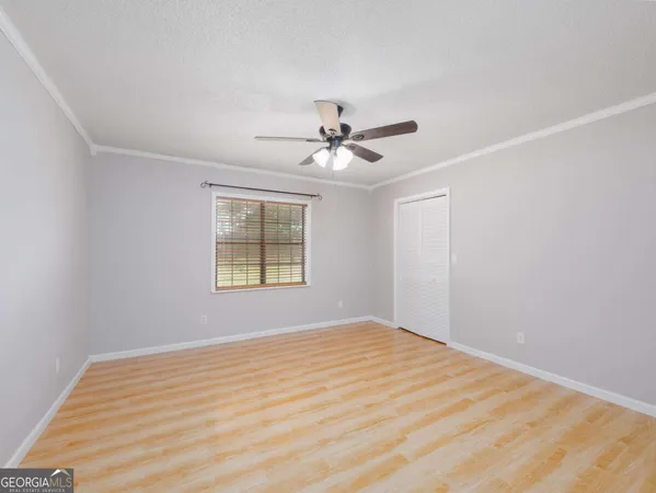 a bathroom with a sink a mirror and a shower