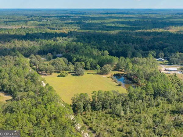 a view of a lake from a yard