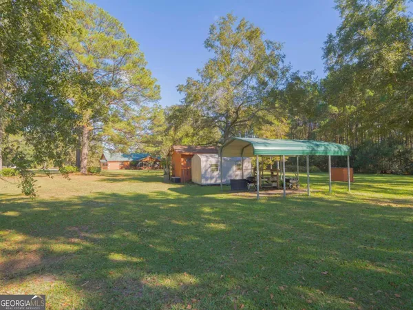 a view of outdoor space and yard