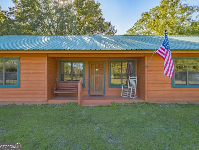 a front view of house with yard
