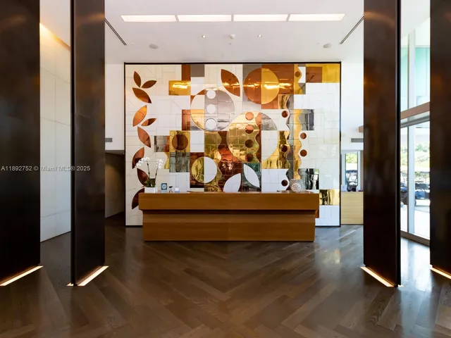 a view of a swimming pool with a yard and potted plants