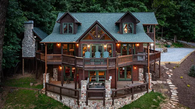 a view of a park with furniture and garden