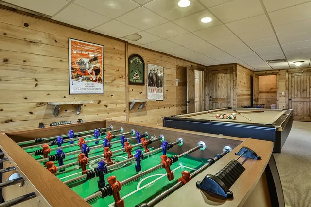 a view of a balcony with furniture