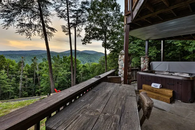 a view of a yard with large tree and a table