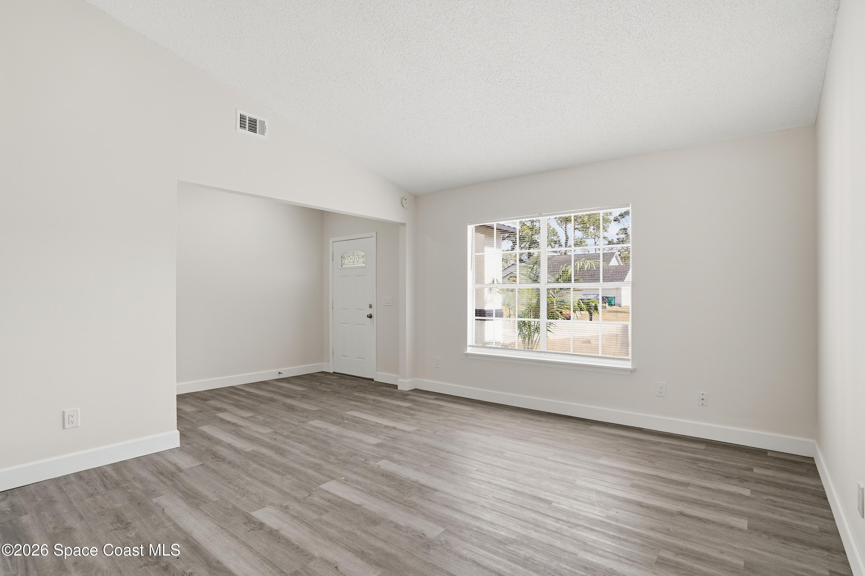 6438 Hudson Road Cocoa, FL 32927 - Photo 12 of 13 06_6438_Hudson_Rd_Cocoa_FL_32927-Living_