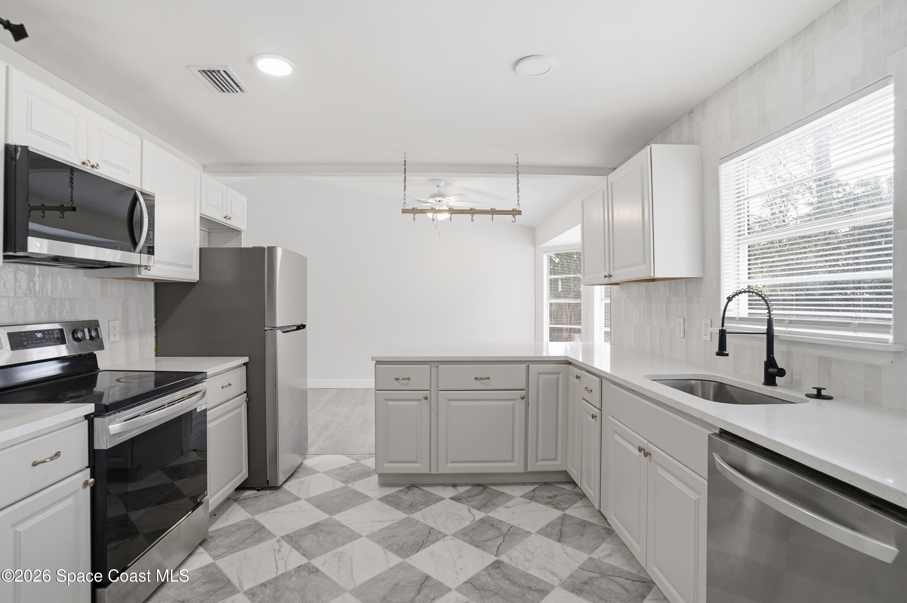 6438 Hudson Road Cocoa, FL 32927 - Photo 2 of 13 11_6438_Hudson_Rd_Cocoa_FL_32927-Kitchen