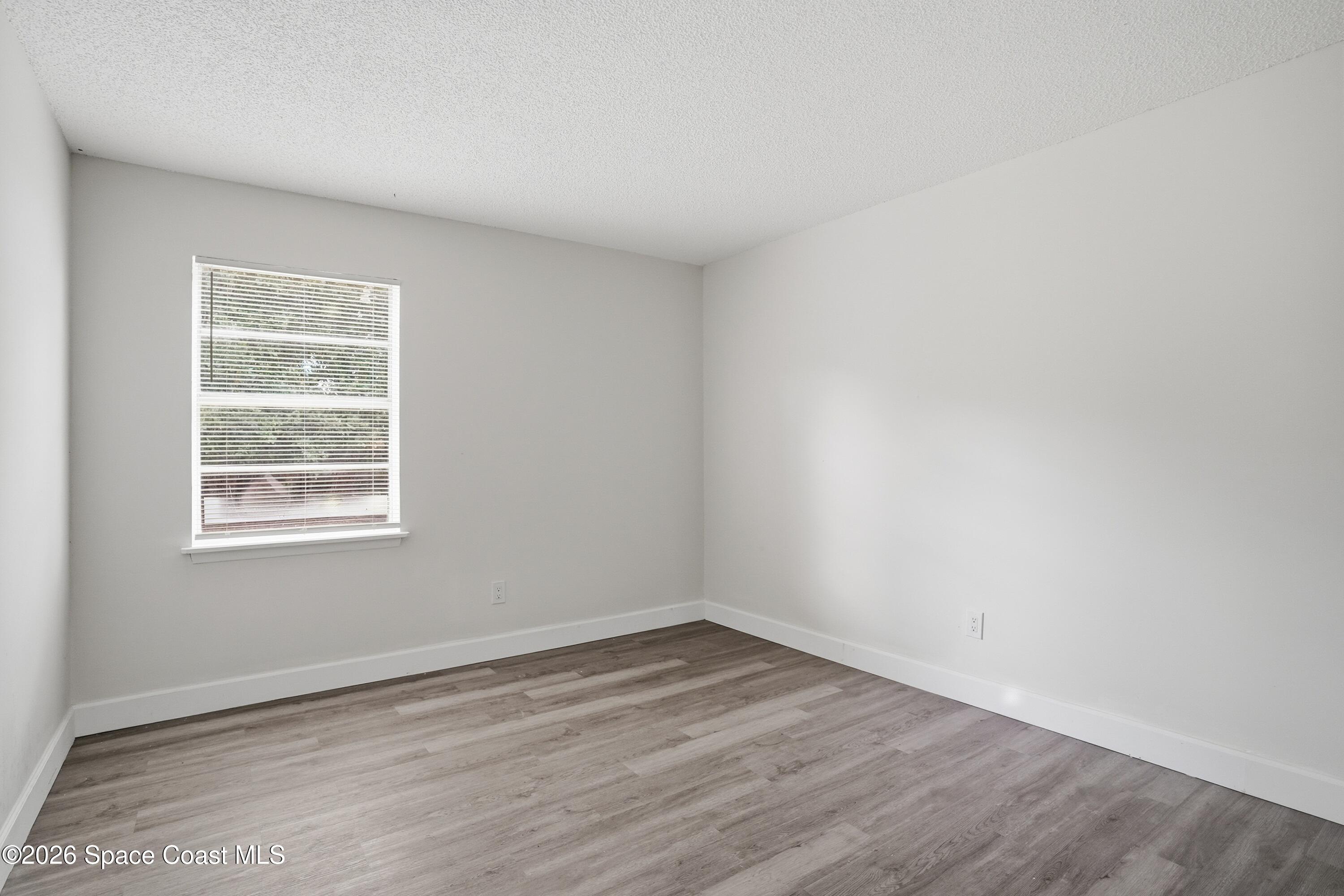 6438 Hudson Road Cocoa, FL 32927 - Photo 7 of 13 08_6438_Hudson_Rd_Cocoa_FL_32927-Living_