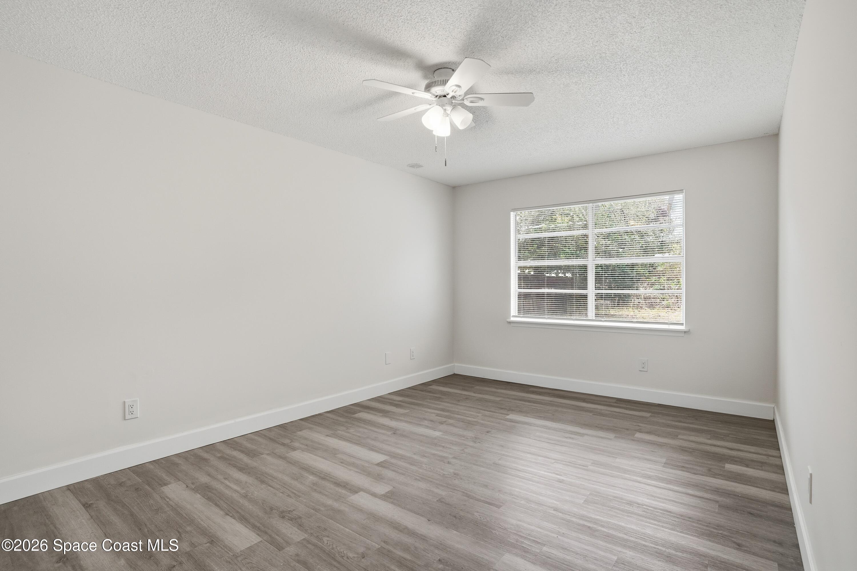 6438 Hudson Road Cocoa, FL 32927 - Photo 8 of 13 09_6438_Hudson_Rd_Cocoa_FL_32927-Living_