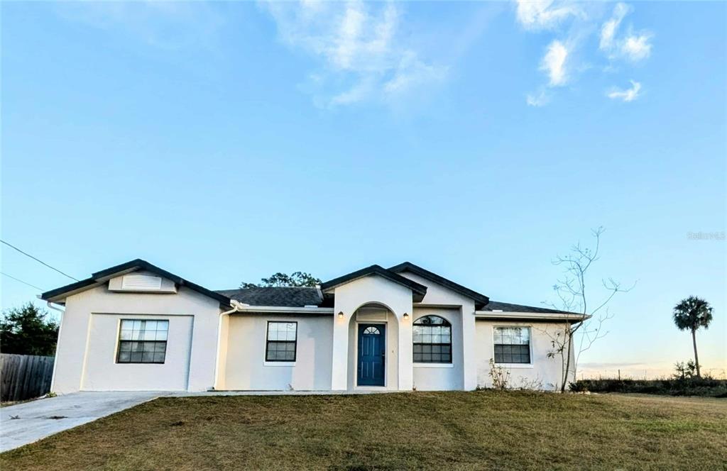 1511 Southwest Shorewood Drive Dunnellon, FL 34431 - Photo 1 of 31 a view of a house with a yard