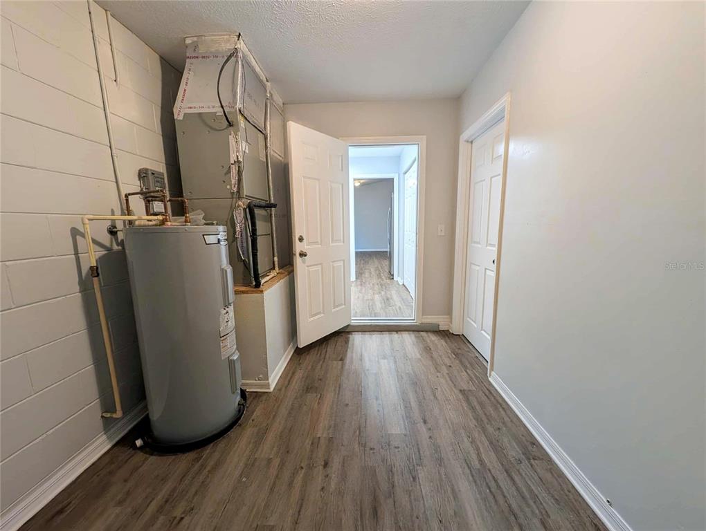 1511 Southwest Shorewood Drive Dunnellon, FL 34431 - Photo 18 of 31 a view of a storage & utility room with wooden floor