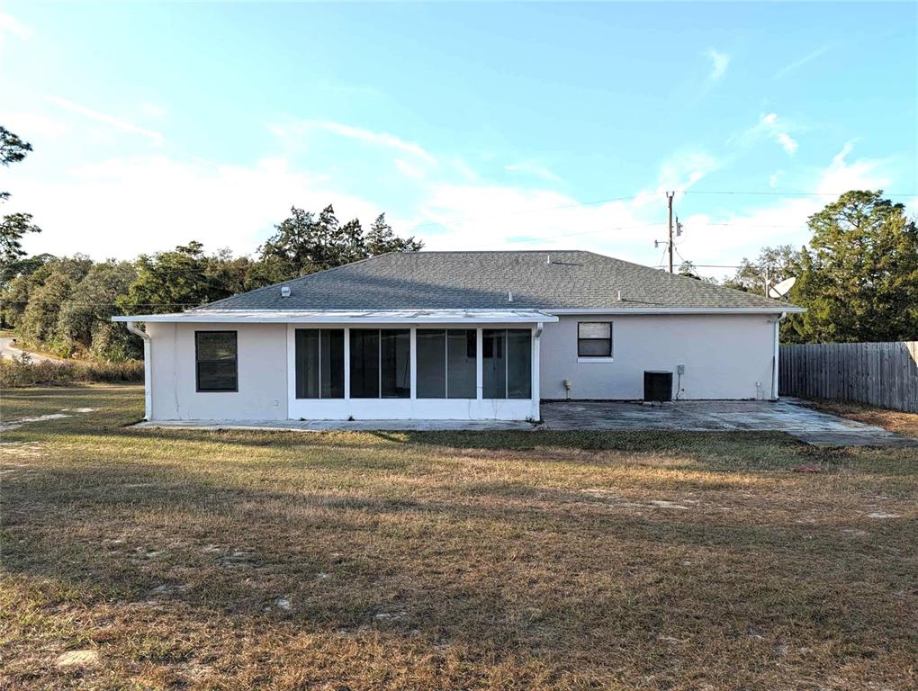 1511 Southwest Shorewood Drive Dunnellon, FL 34431 - Photo 27 of 31 a view of a house with a yard