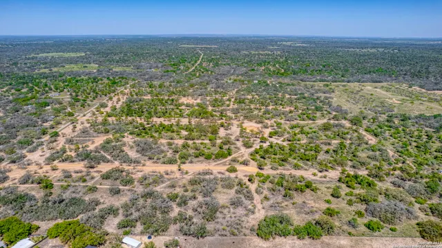 a view of a yard with an outdoor space
