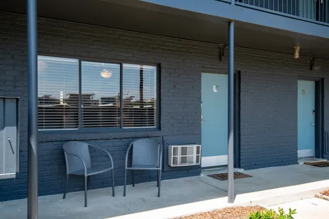 a view of backyard with cabin