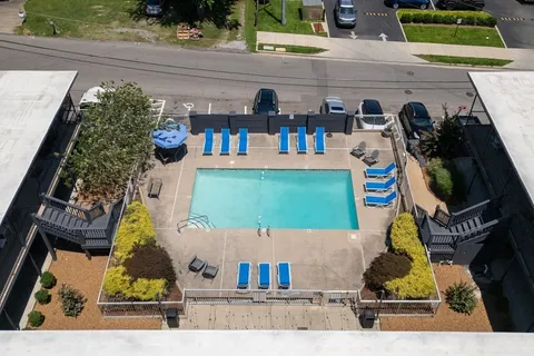 a view of a dinning table and chairs in patio