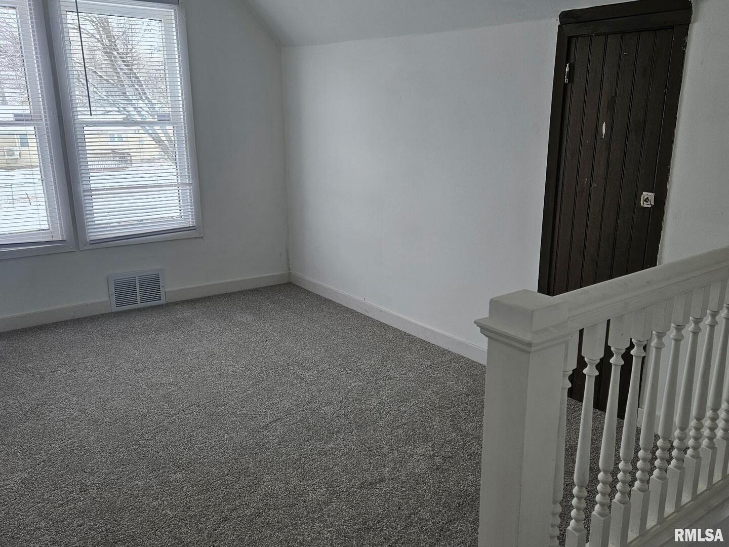 201 East May Street Joy, IL 61260 - Photo 15 of 18 an empty room with windows