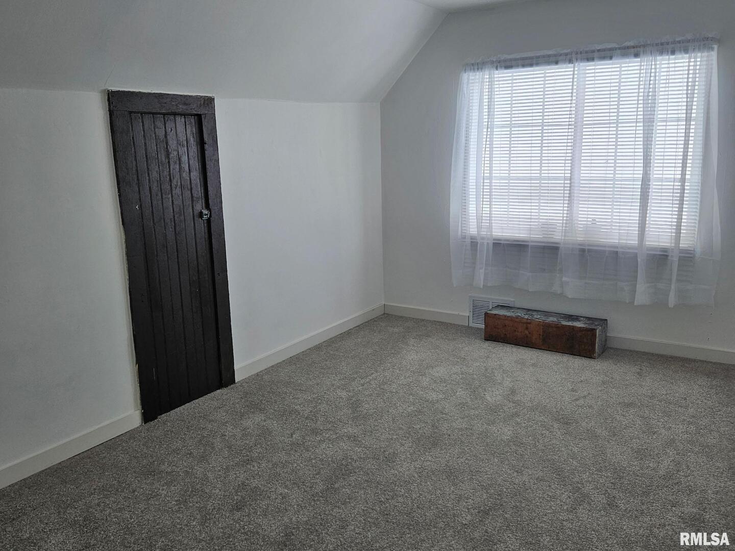 201 East May Street Joy, IL 61260 - Photo 17 of 18 an empty room with windows